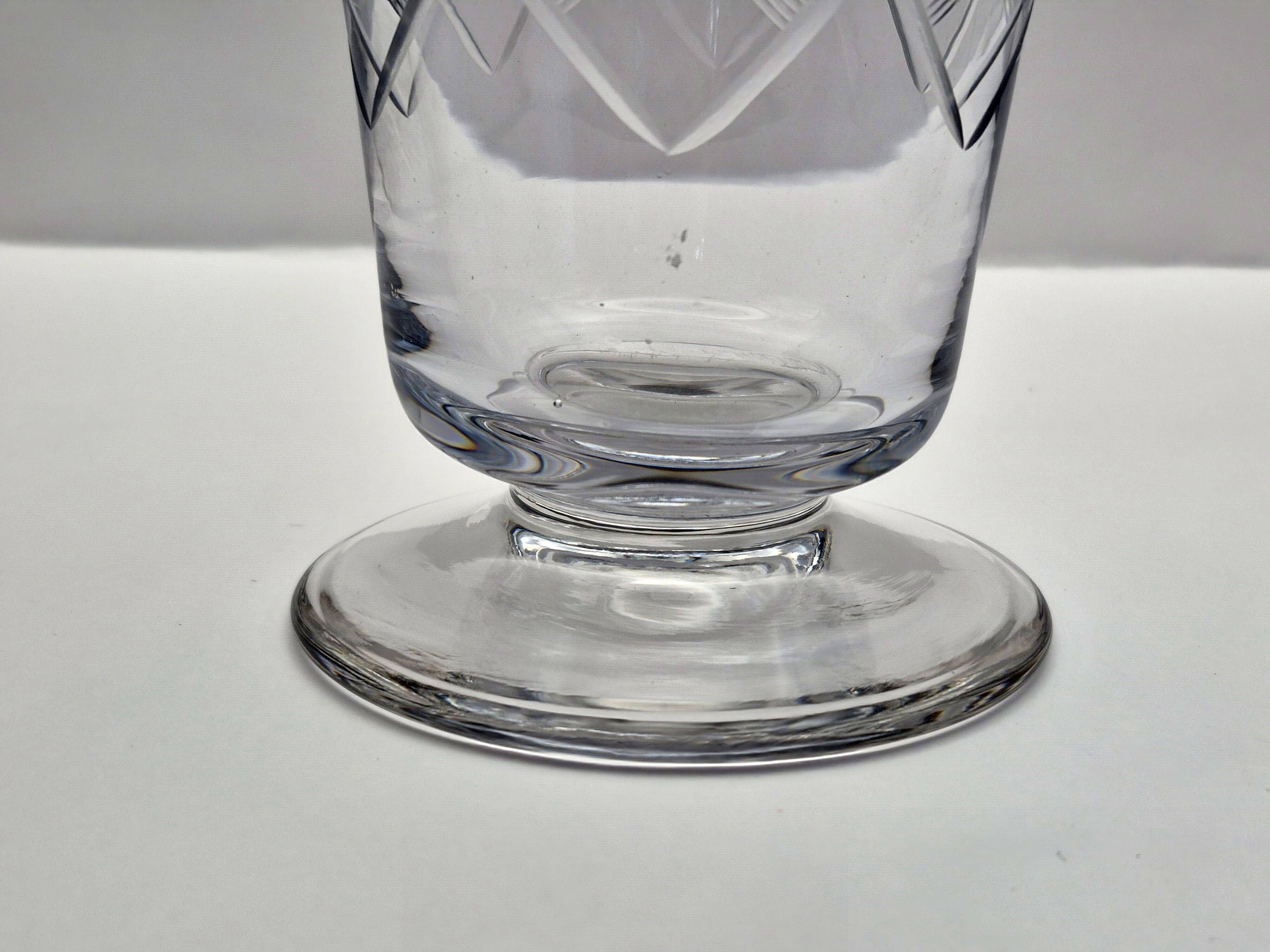 Crystal service from Fains, matching wine carafe and water jug.