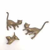 Couple brass cats and their baby cat