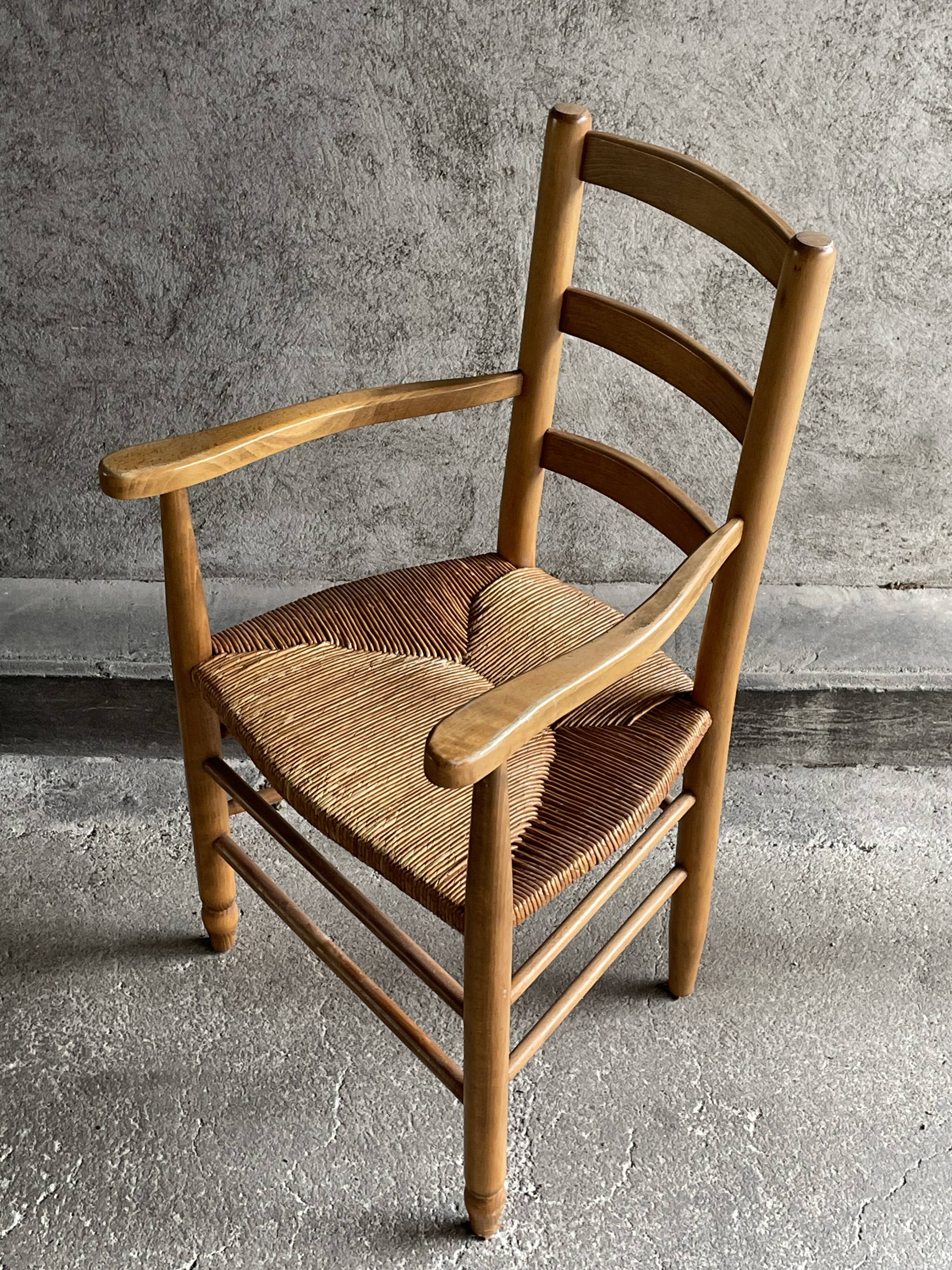 Straw chair with armrests, France