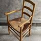 Straw chair with armrests, France