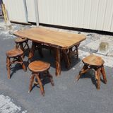 Table and 6 brutalist stools 1970