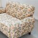 2-seater sofa, floral fabric, wooden structure, plastic and wooden legs, 1970