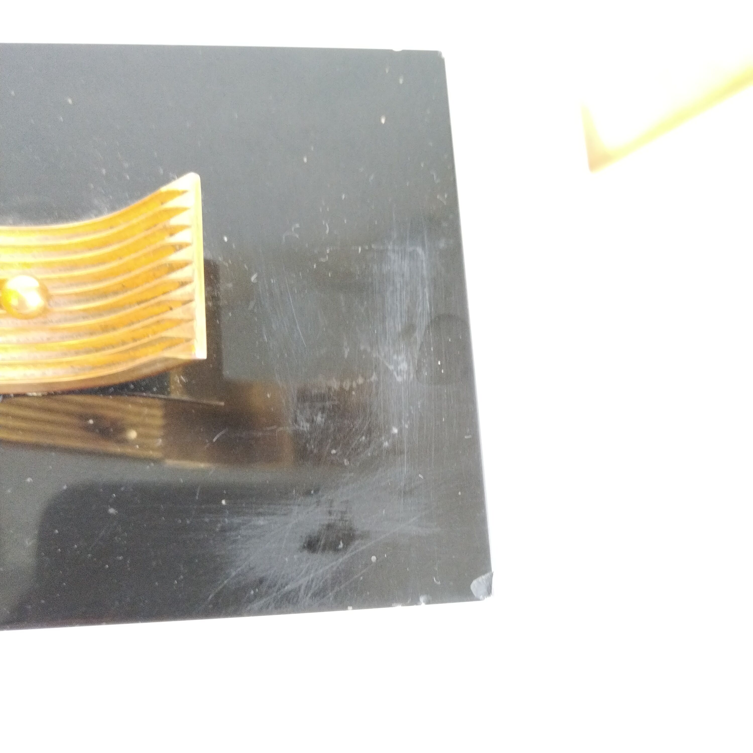 Pair of vintage Art Deco style bookends in marble and gold-plated metal