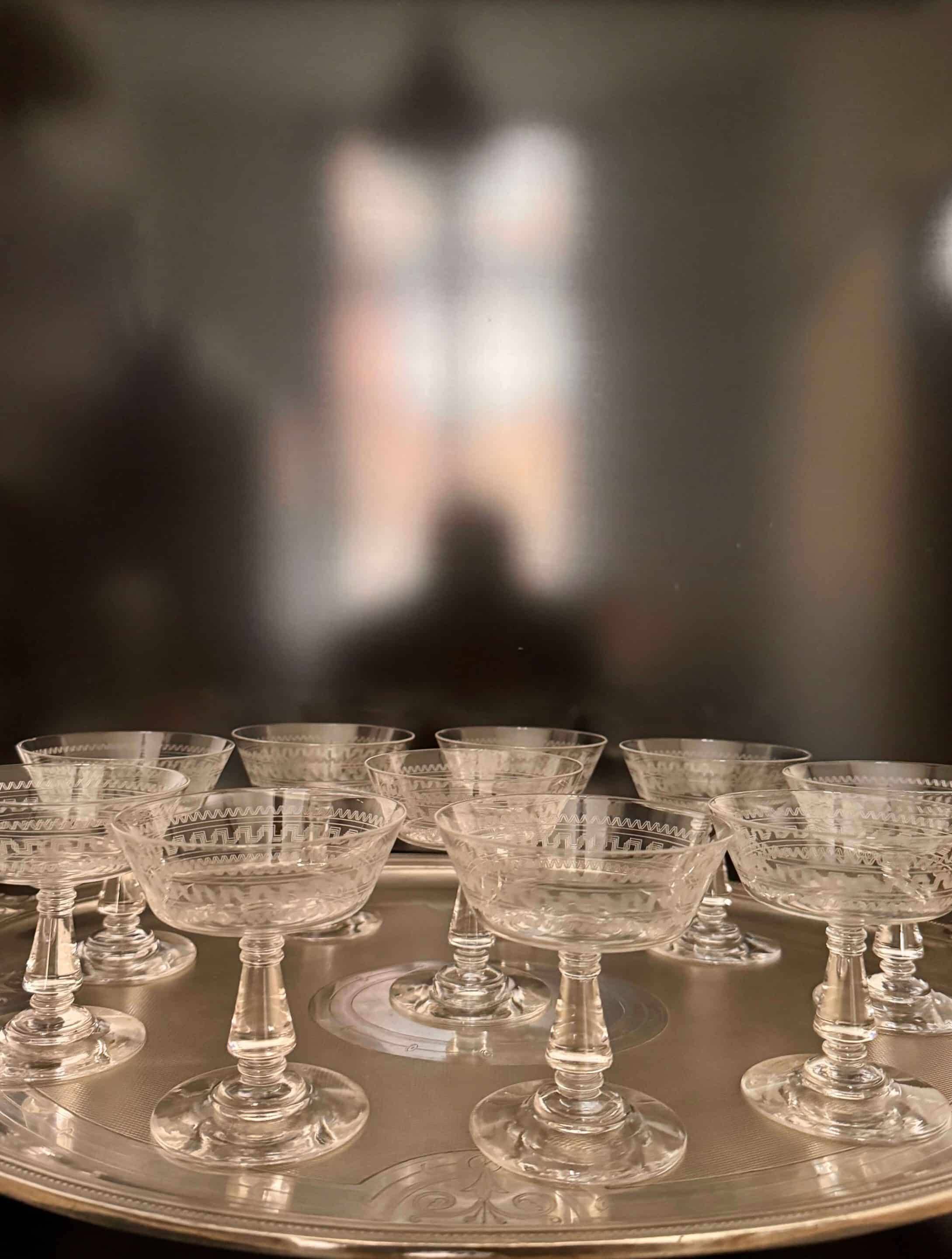 Baccarat, set of 10 engraved crystal champagne glasses from 1900.