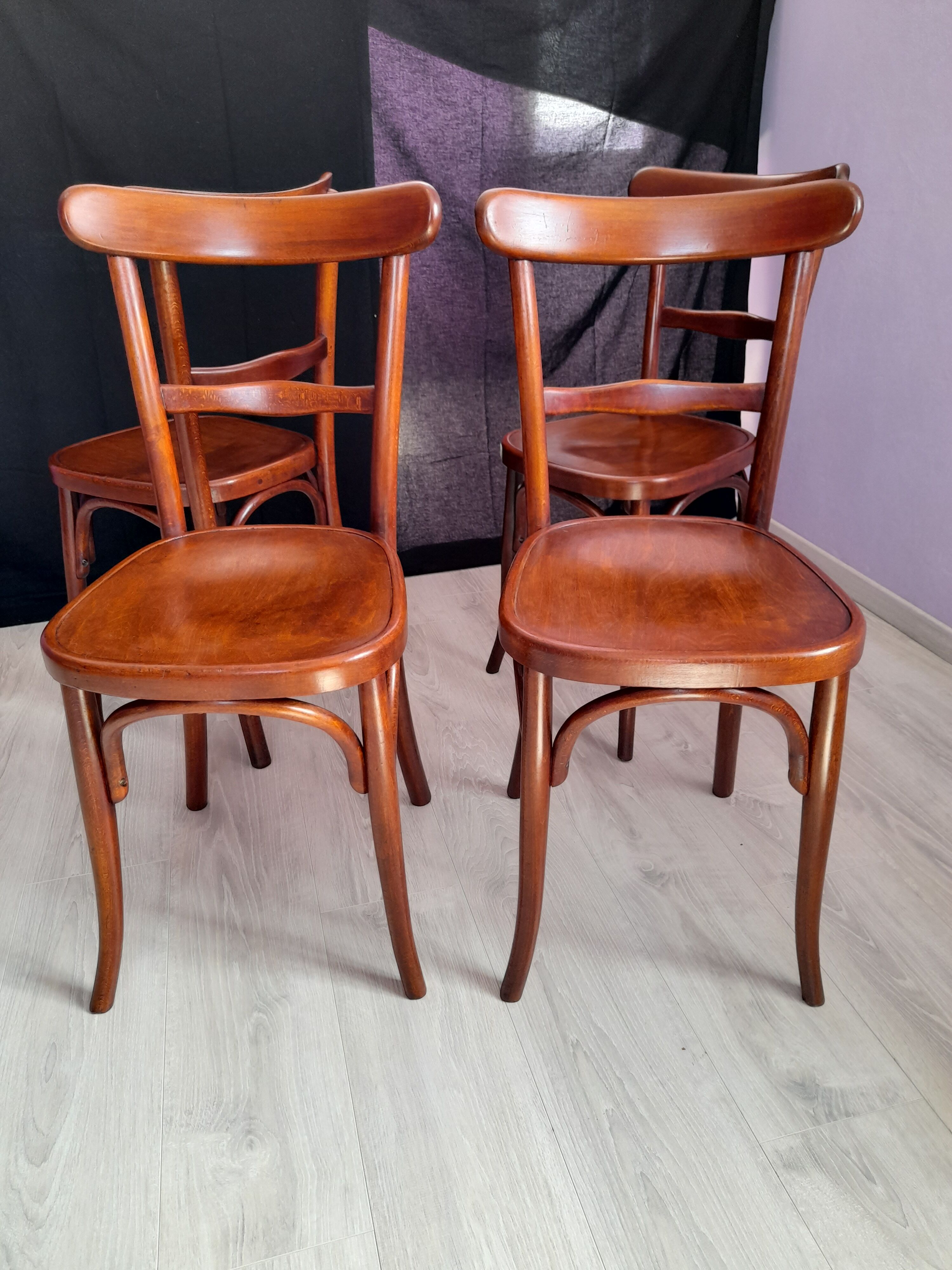 Suite of 4 bistro chairs, published by fischel