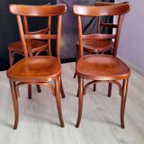 Suite of 4 bistro chairs, published by fischel