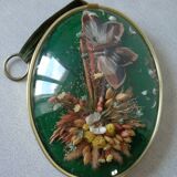 Frame medallion bouquet of dried natural flowers butterfly feather domed glass