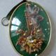 Frame medallion bouquet of dried natural flowers butterfly feather domed glass