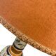 Vintage orange Portuguese table lamp with a ceramic base.