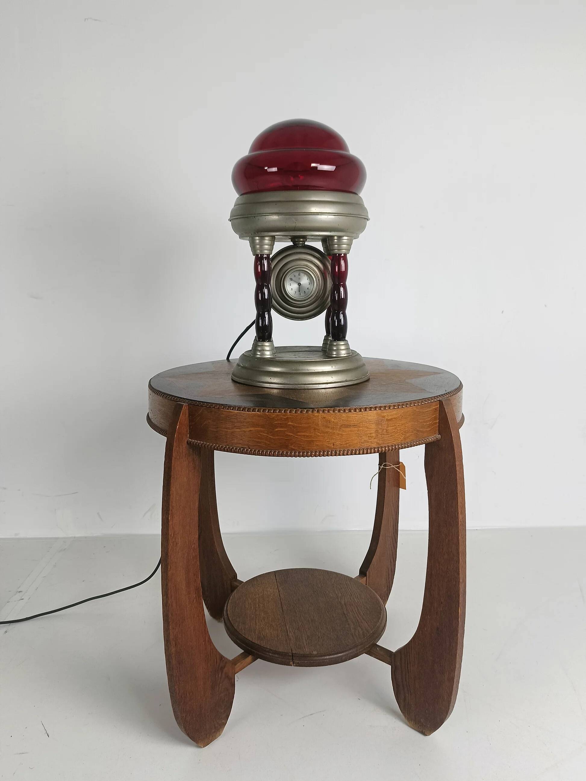 Unique vintage tin lamp with clockwork