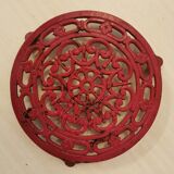 Burgundy cast iron trivet
