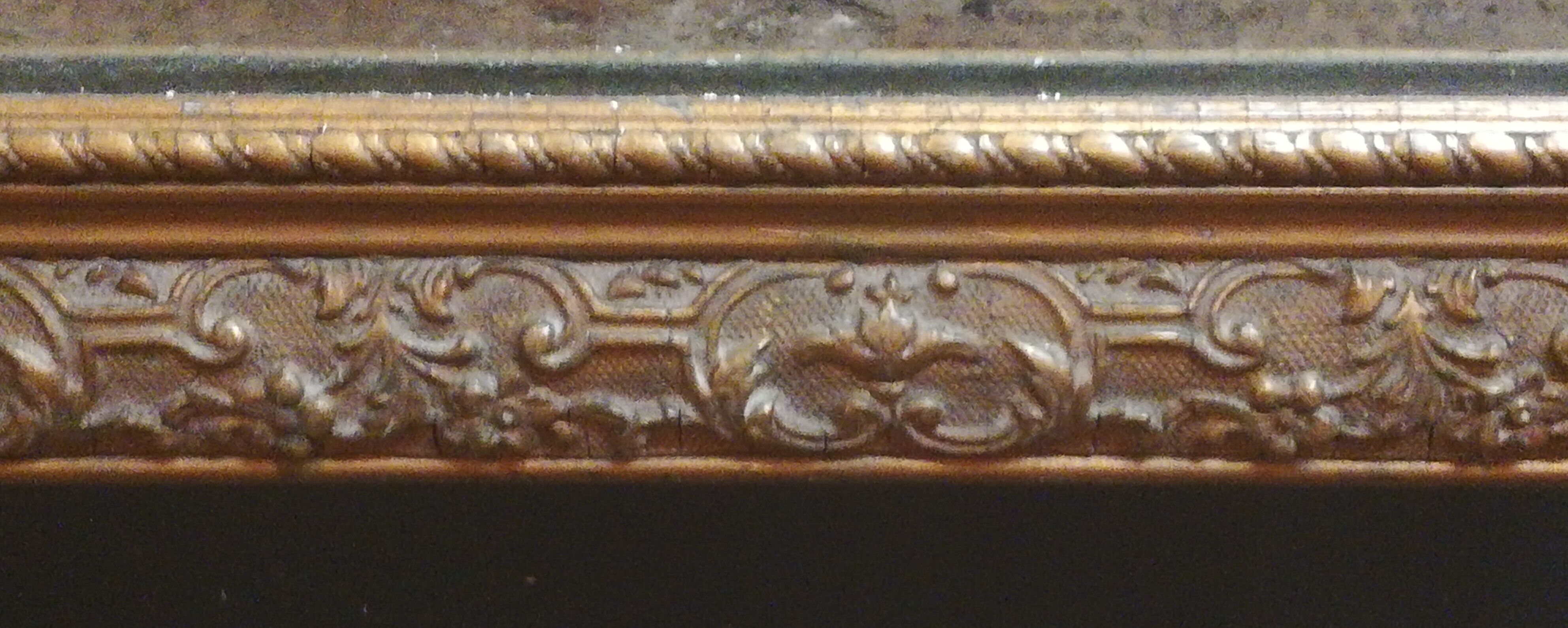 High and narrow mirror in gilded stucco late nineteenth century