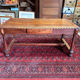 Large antique carved wooden desk in Renaissance style