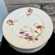 8 assiettes en porcelaine fleurie, fin XIXeme