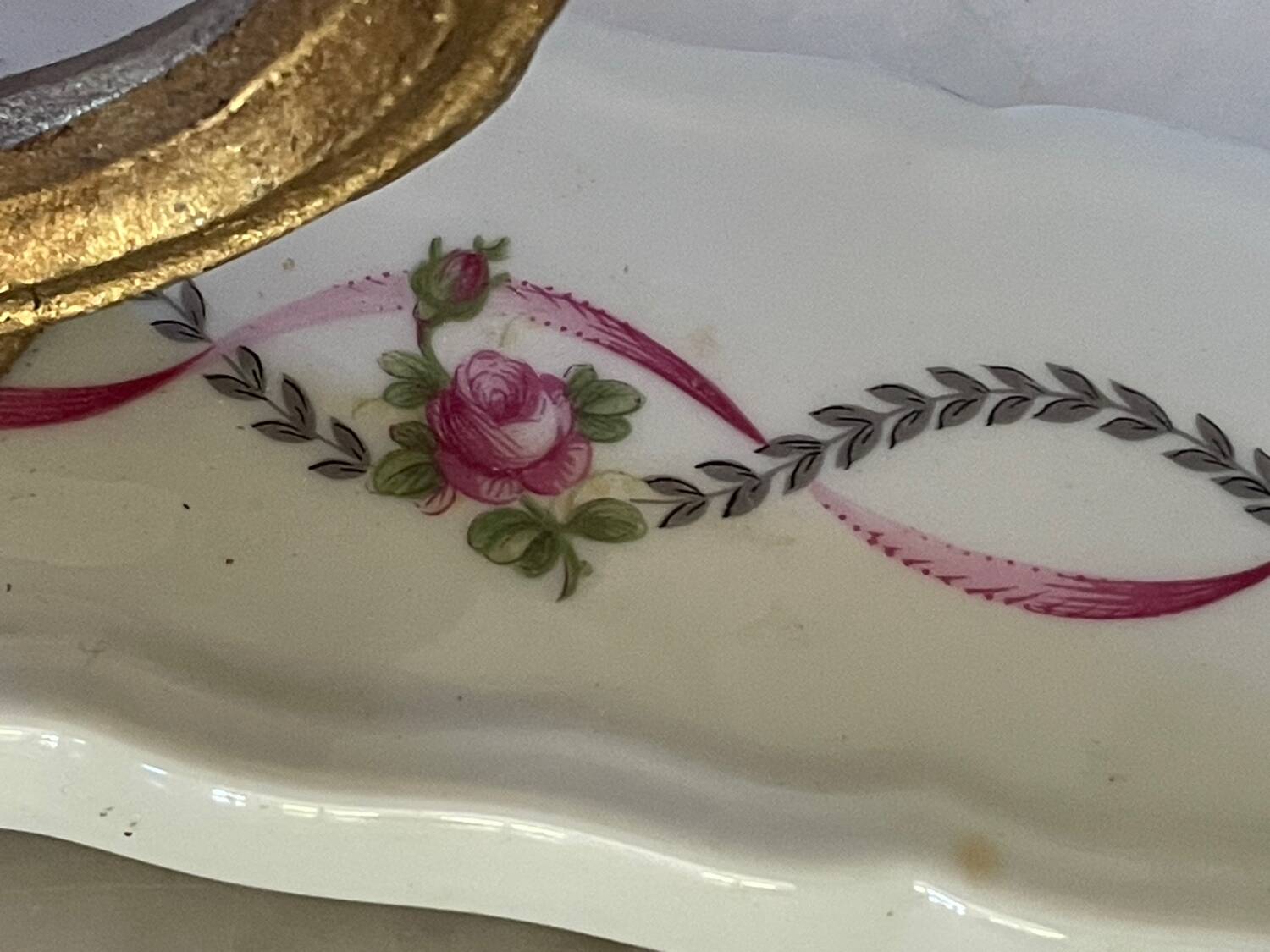 Pair of cut glass and Limoges porcelain wall sconces