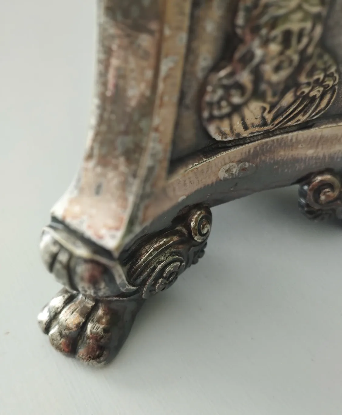 Old church candlestick in silver-plated metal