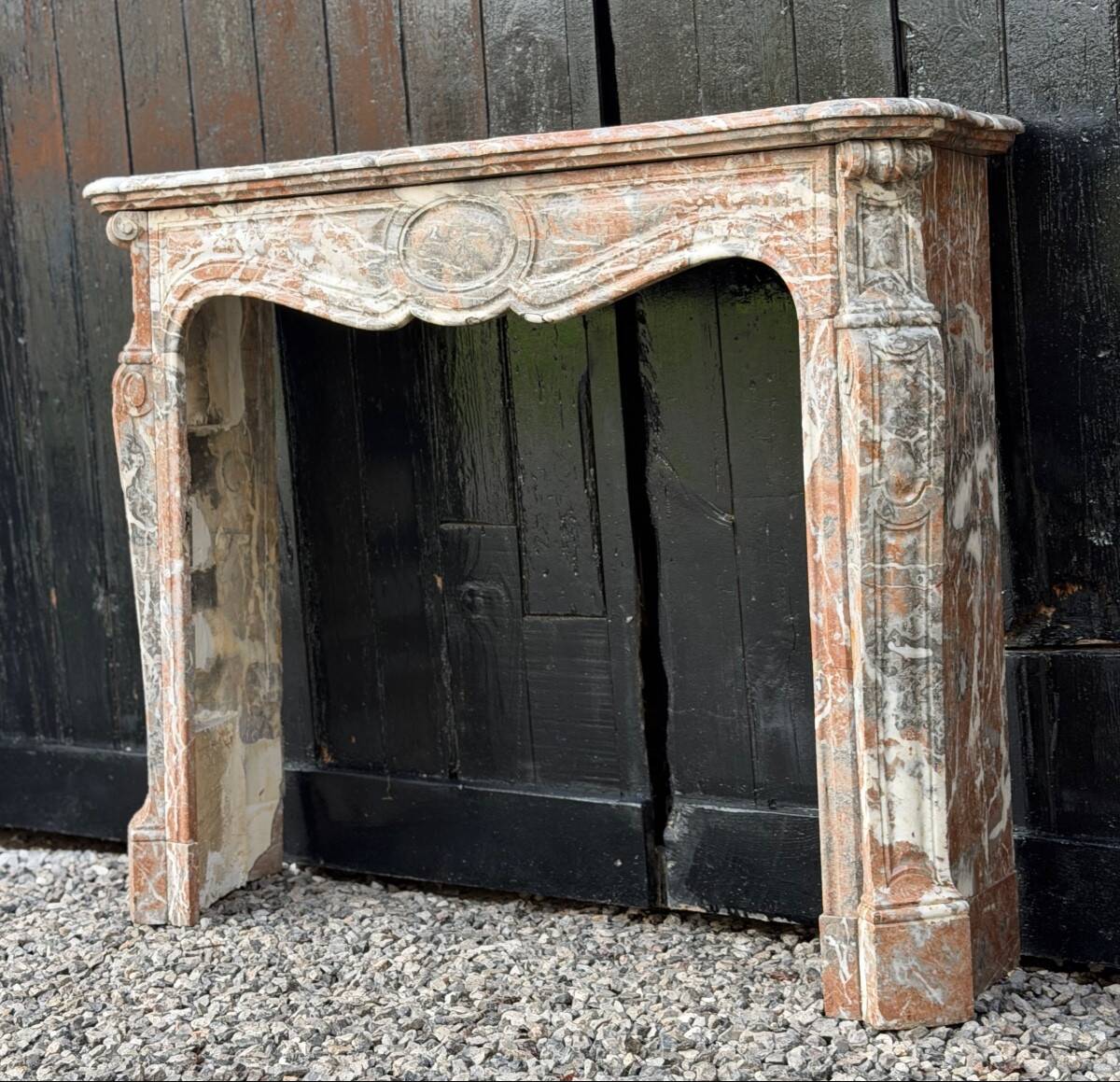 Louis XV style fireplace in grey Ardennes marble, circa 1900.