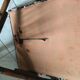 Faux bamboo chair with cushion