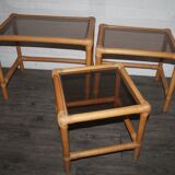 Rattan nesting tables in rattan and smoked glass from the 70s