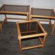 Rattan nesting tables in rattan and smoked glass from the 70s