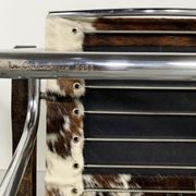 Pair of LC1 cow skin chairs by Le Corbusier for Cassina 1970