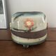 Superb handcrafted pottery pot with relief flowers signed on the back.