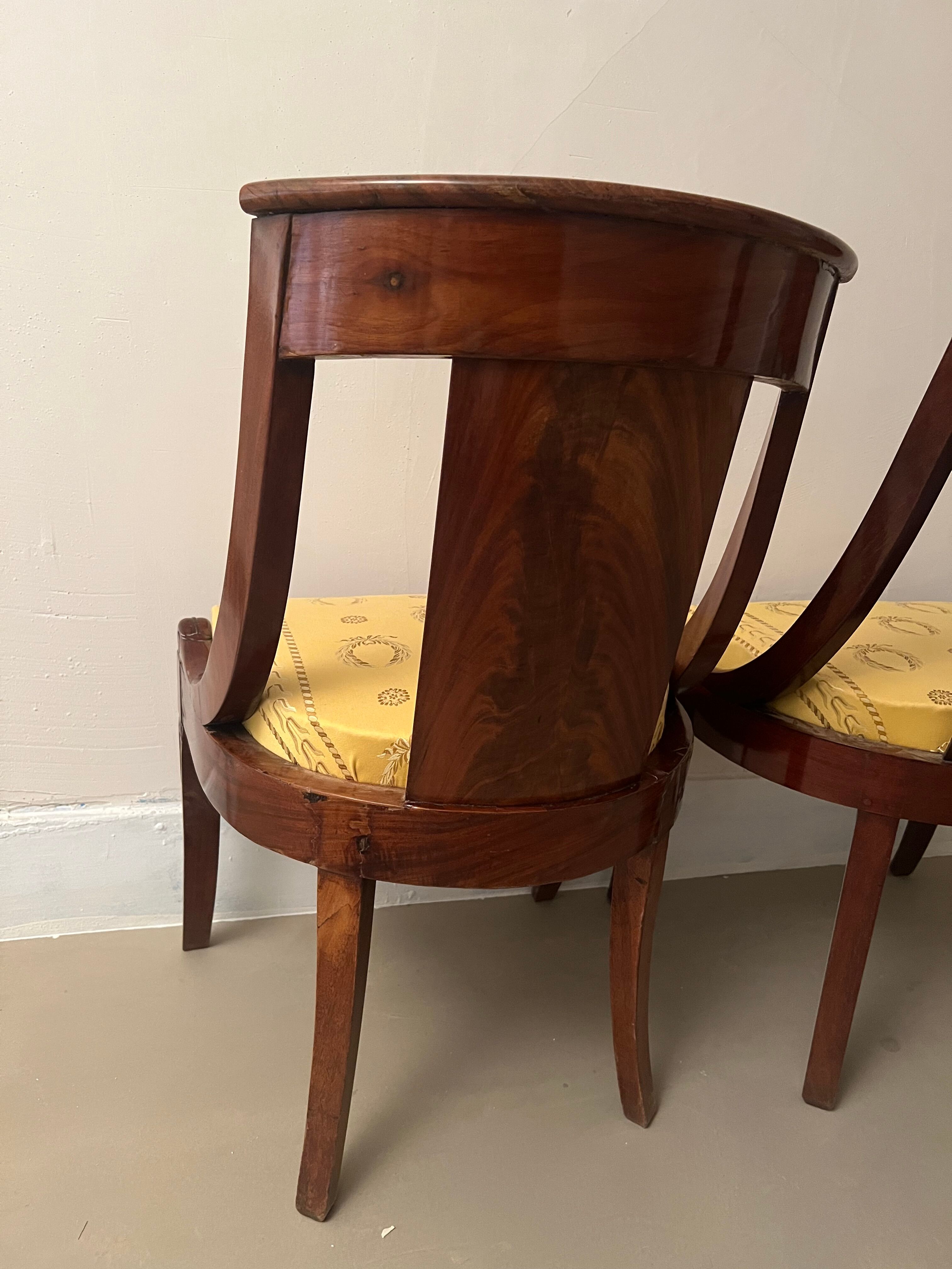 Pair of mahogany empire chairs