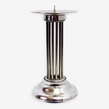 Candle holder in silver metal