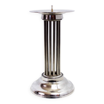 Candle holder in silver metal