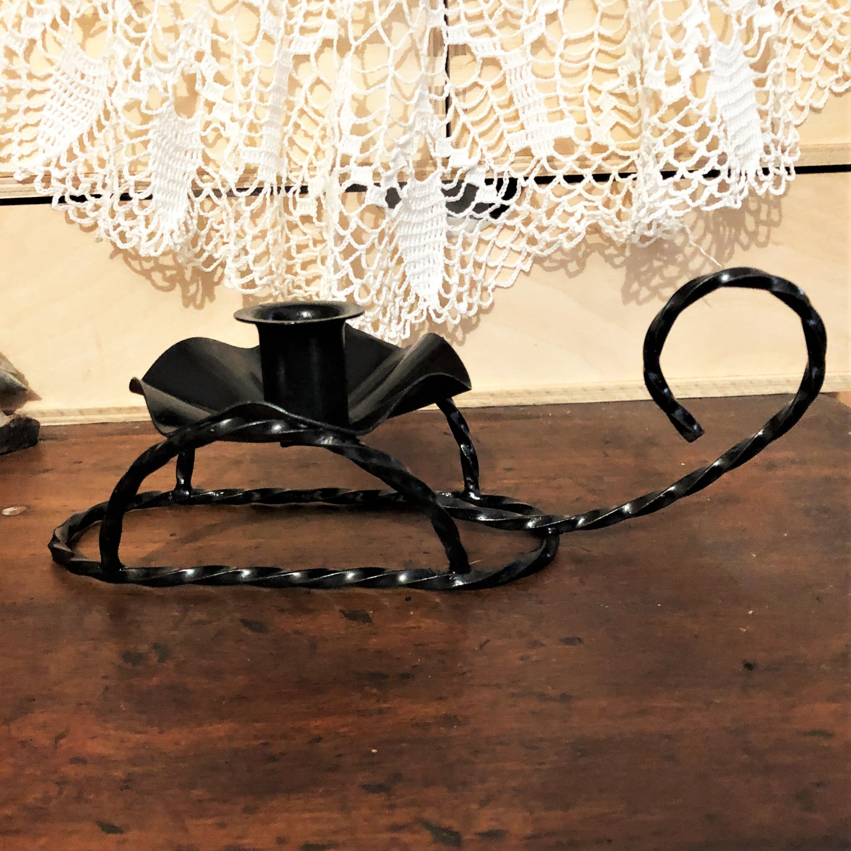 Handmade hand candle holder in vintage black wrought iron