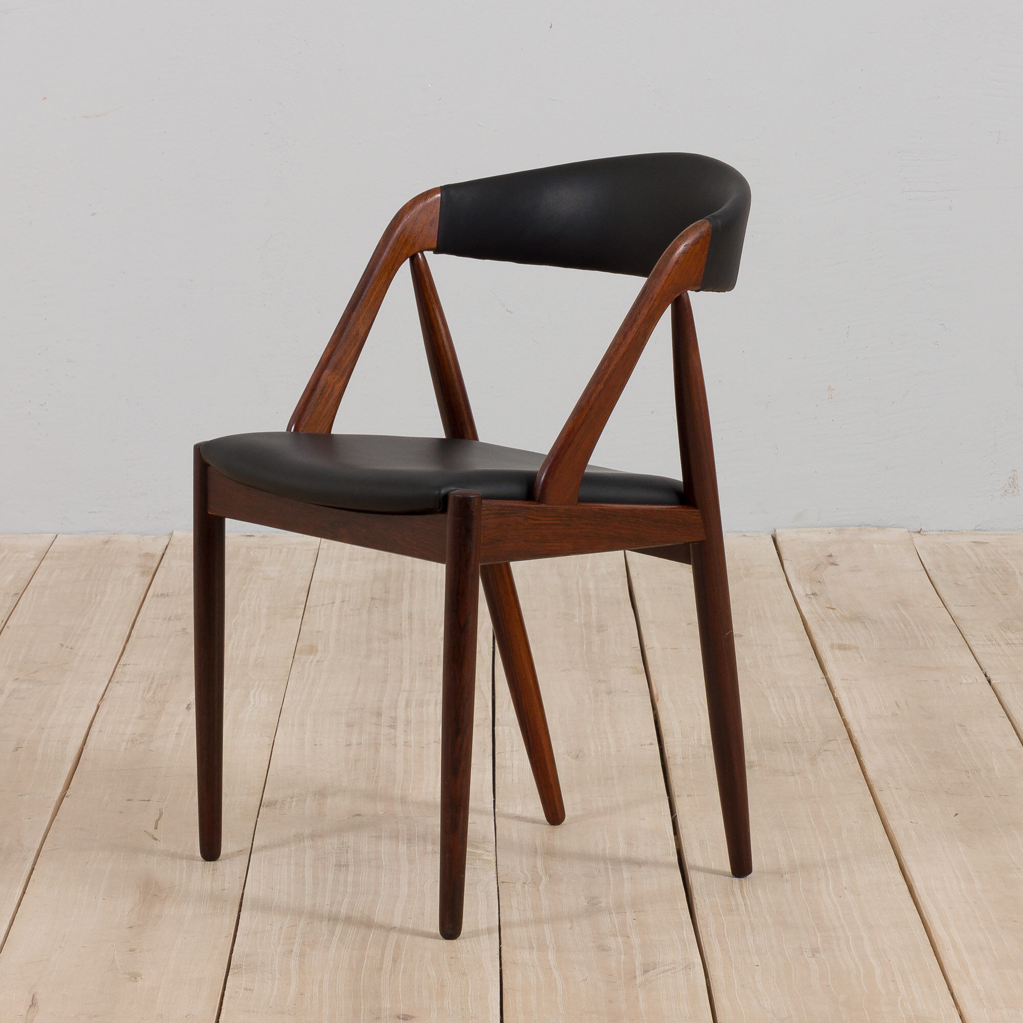Kai Kristiansen rosewood desk chair 31 in reupholstered in soft black leather, Denmark, 60s