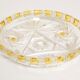 Decorative plate in transparent and vintage yellow glass, Italy, 1960s.