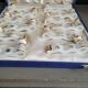 12 Limoges art porcelain knife rests in their case