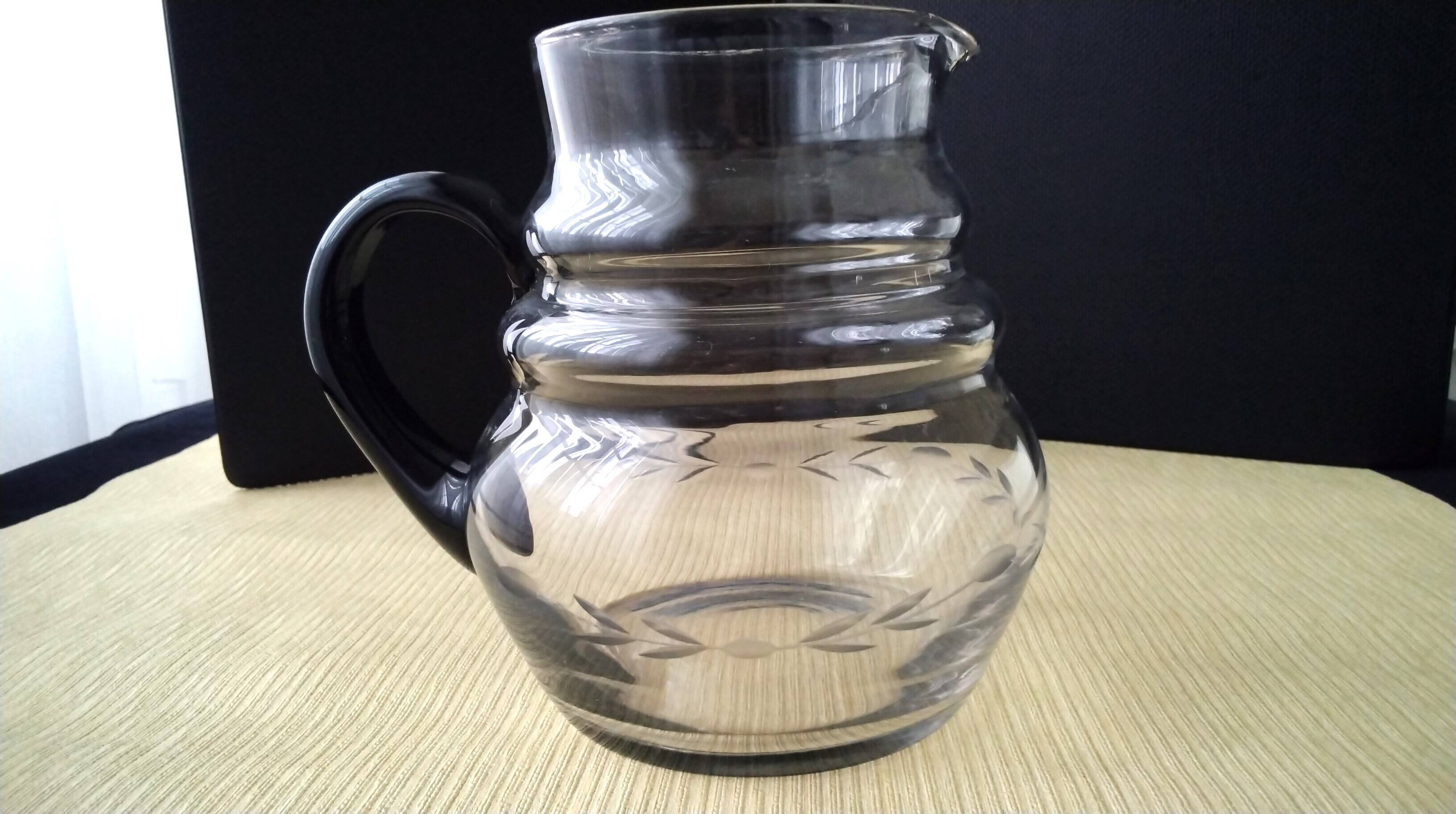 Water jug, blown glass carafe. Delicate engraved decoration