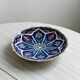 Decorative plate in glazed ceramic
