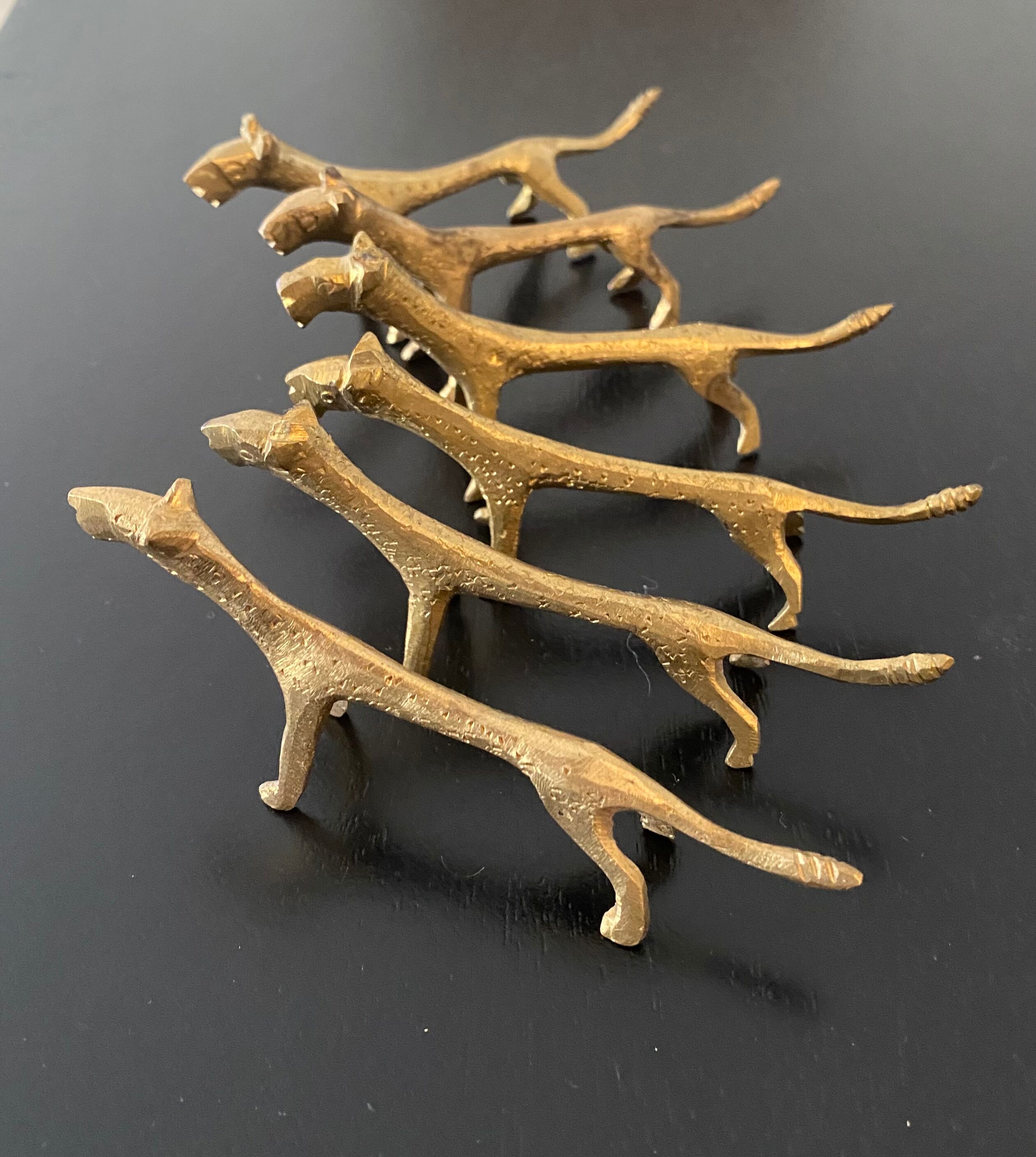 6 lioness-shaped brass knife holders