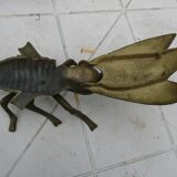 Old brass ashtray in the shape of a fly