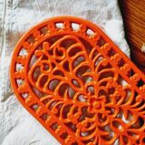 Orange enamelled cast iron oval trivet