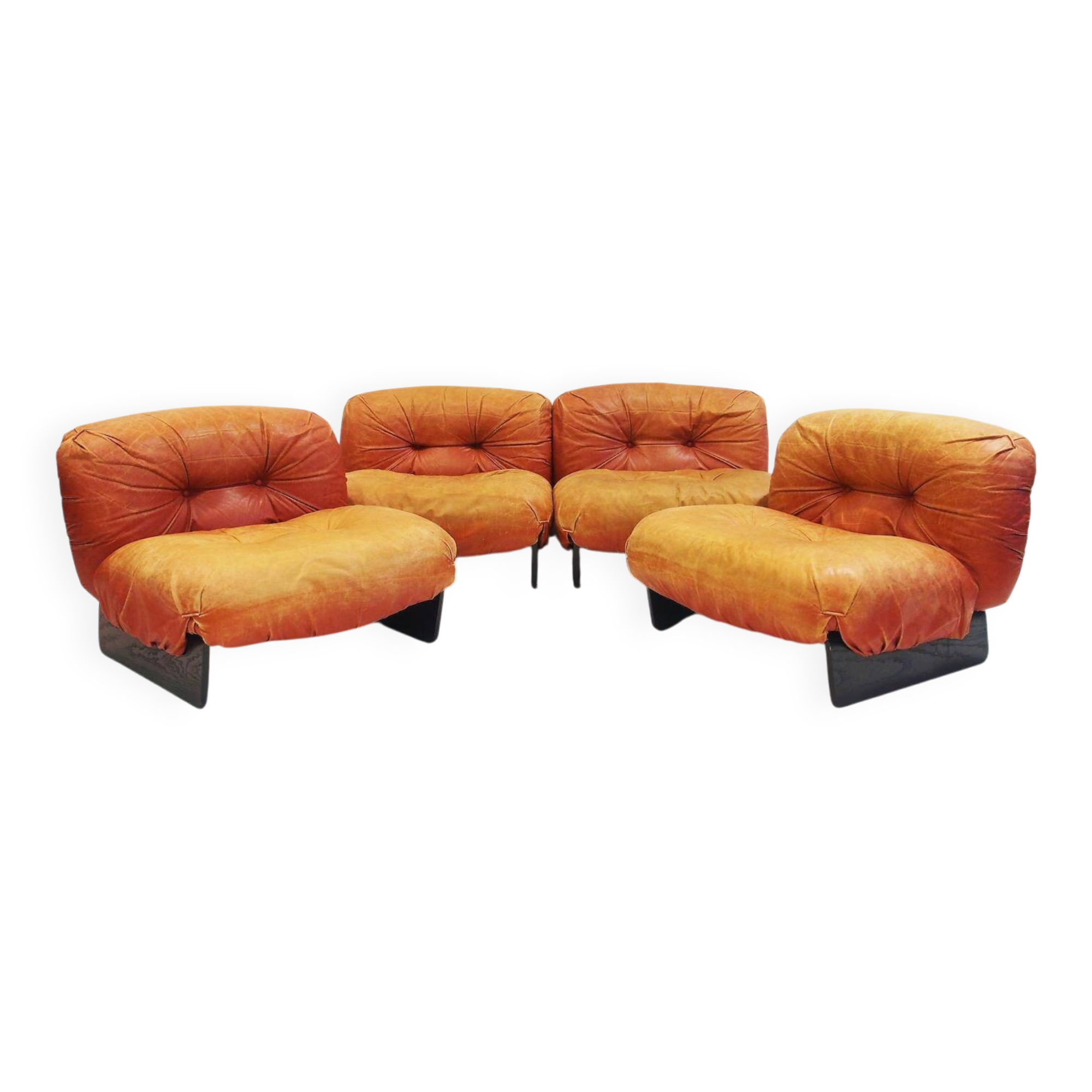 Set of four modular sun loungers by Giuseppe Munari upholstered in cognac leather.