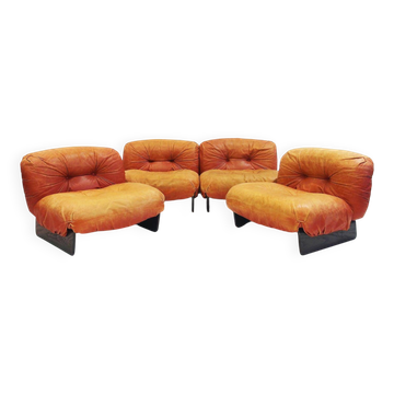 Set of four modular sun loungers by Giuseppe Munari upholstered in cognac leather.