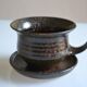 1970s ceramic cup and saucer signed