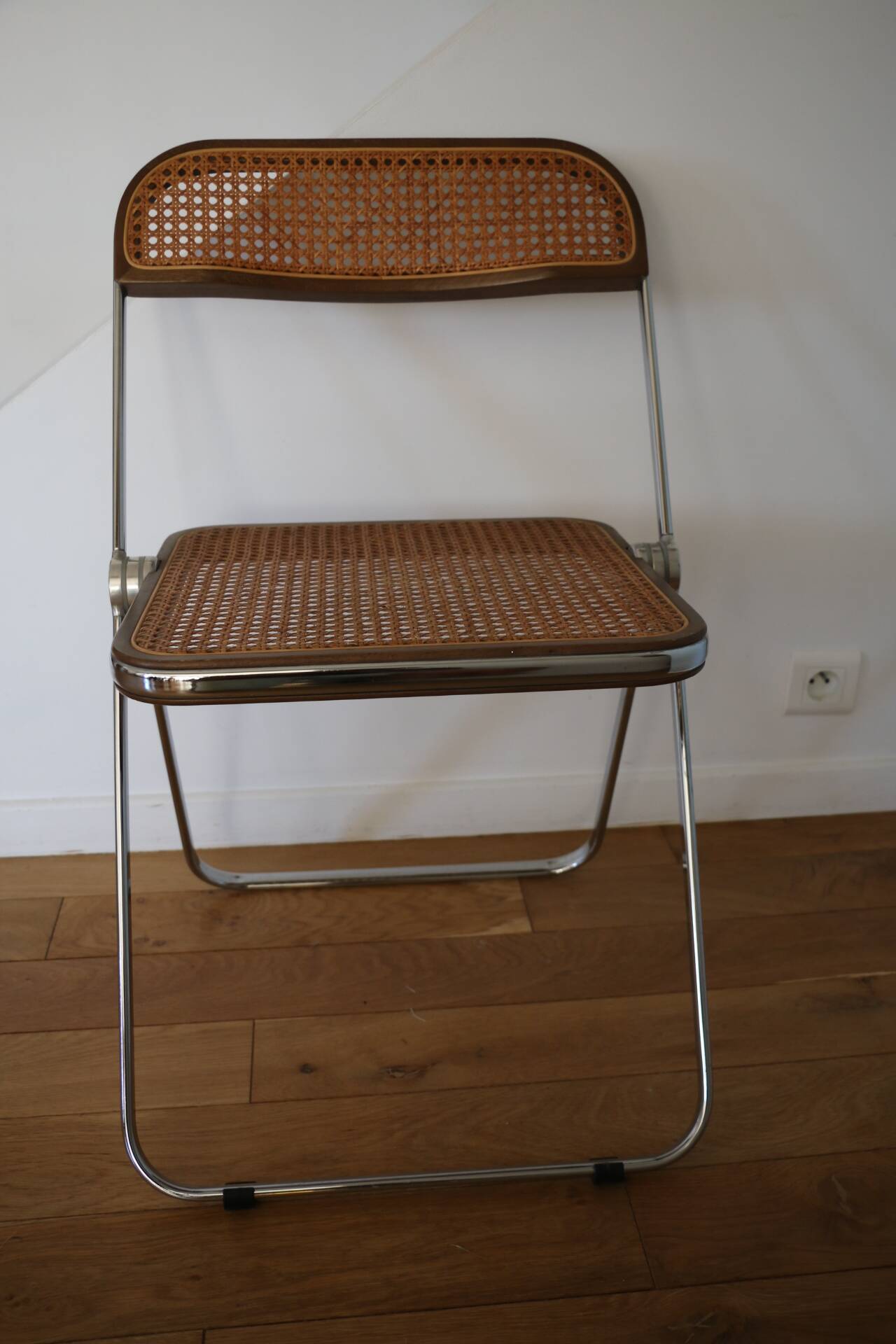 2 plia rattan chairs by piretti