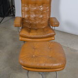 Fauteuil pivotant et son ottoman en cuir