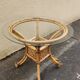 beautiful 1970s bamboo and rattan dining table with a glass top