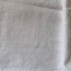 Pair of embroidered white cotton tea towels.