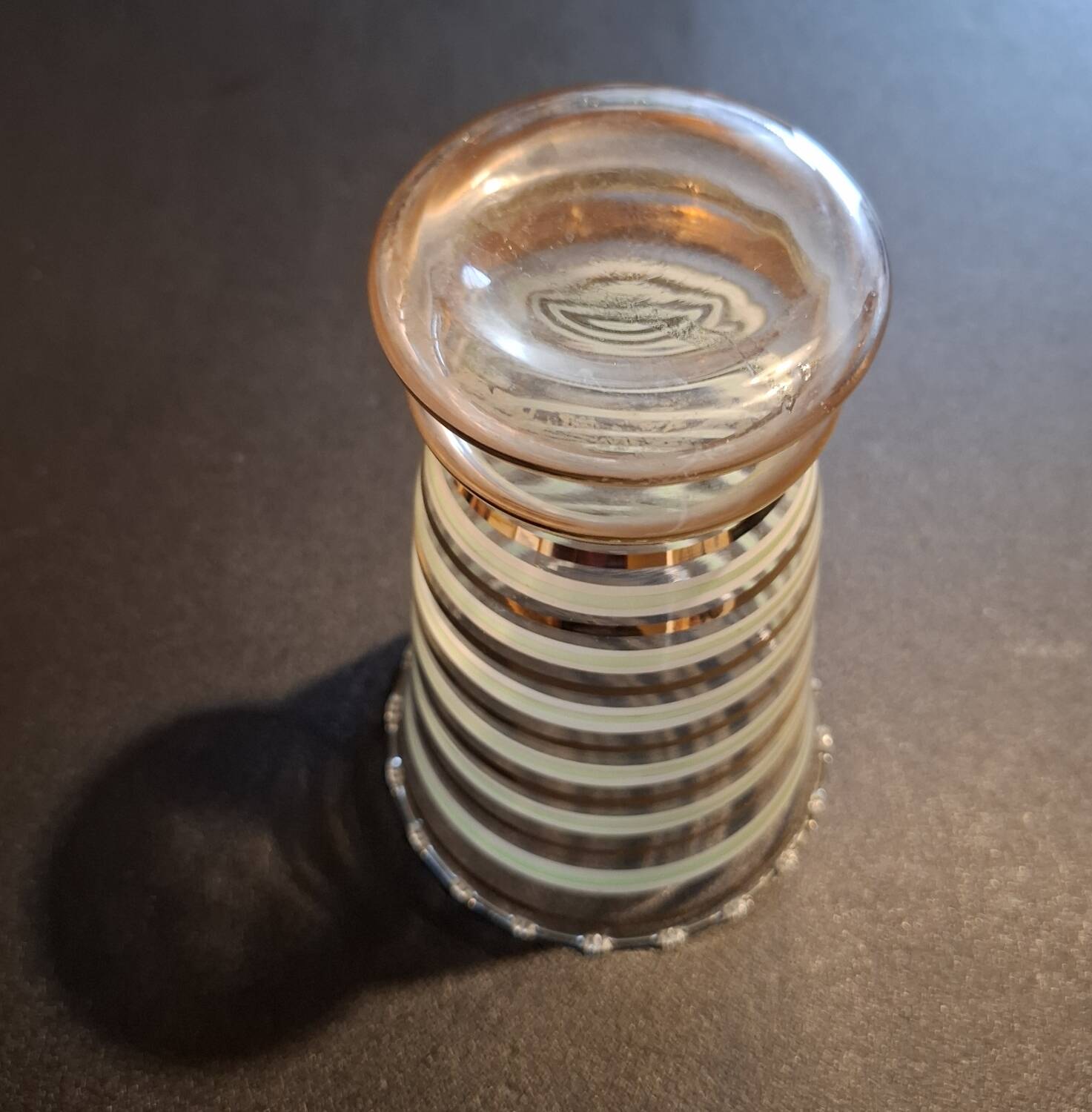 Vintage vase with green and gold trim.