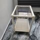 Rattan and cane side table with tinted glass top