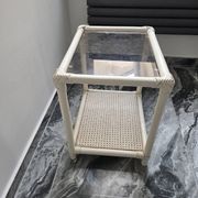 Rattan and cane side table with tinted glass top