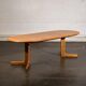 Oval dining table with 2 extensions.