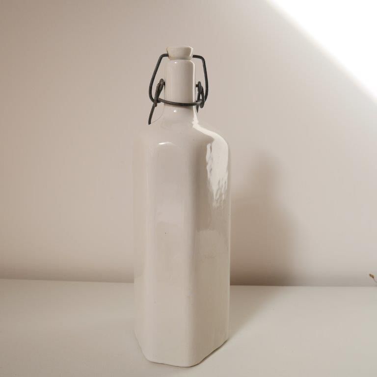 Old stoneware hot water bottle or bottle